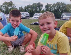 Kids eating popsicles