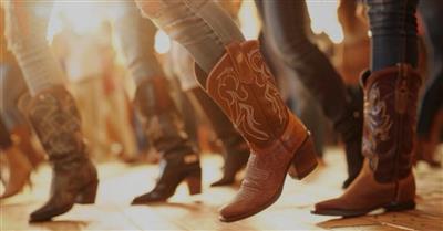 Cowboy boots lined up dancing